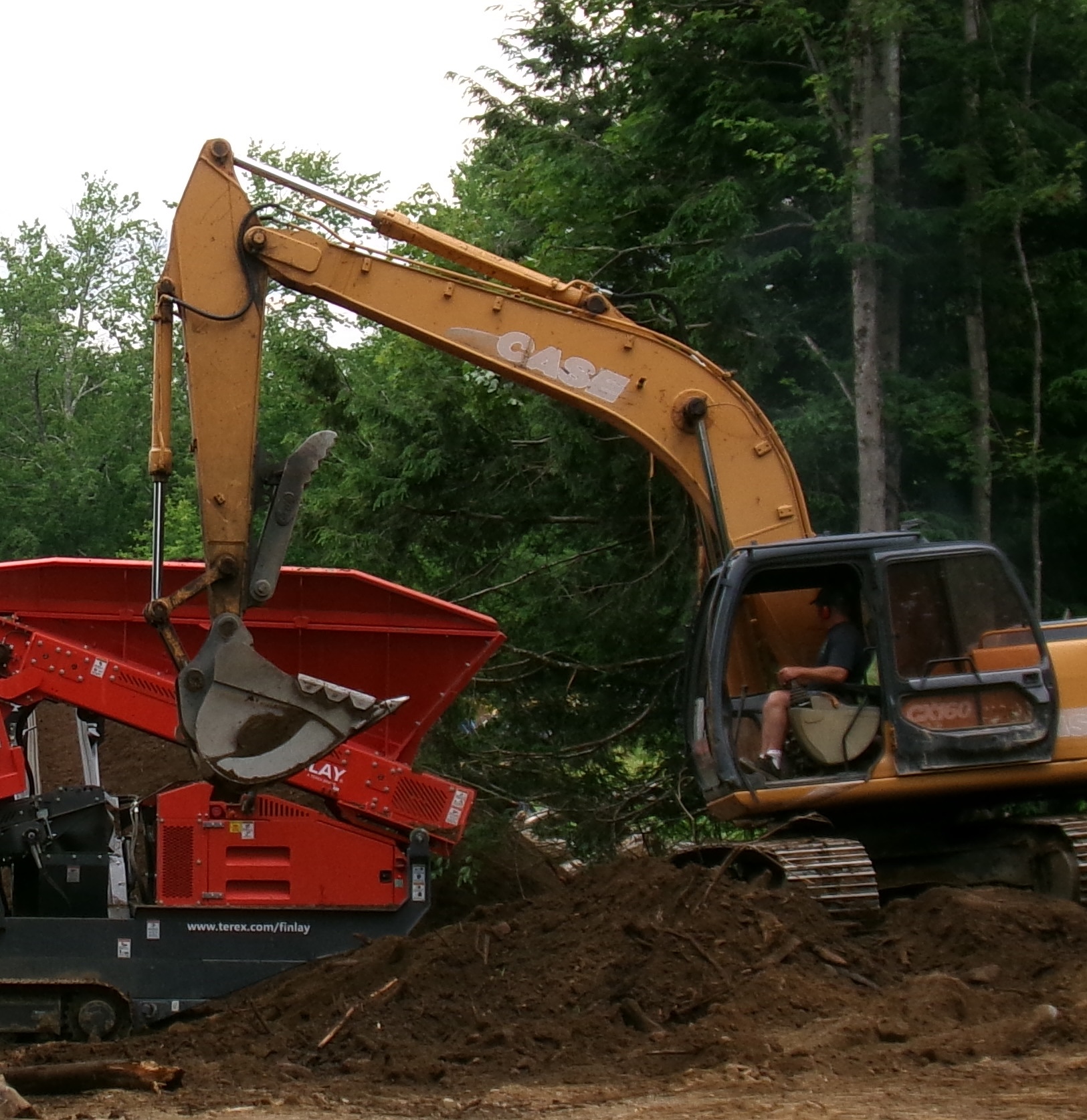 Case CX360 excavator feeding the plant